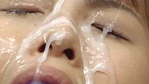 Asians bound up with ball gags getting bukkake cumshots to their faces.