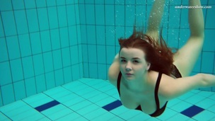 Beautiful Vesta stripping underwater in arousing solo clip