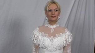 Cute hottie in a wedding dress widens her legs for a admirable fuck