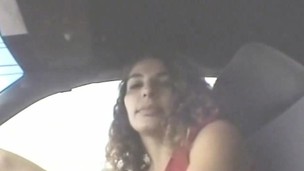 Lewd hooker with a cute smile gives a fabulous blowjob in the car