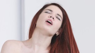 Taut anal opening of red-haired babe is penetrated with dude's dick