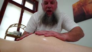 Old masseur with unshaved beard licks and fucks client's pussy