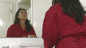 Seeing herself in the mirror made the Asian mature horny and in need of a hard cock. Because she's all alone this bitch will have to handle it herself but luckily she has a vibrator in the drawer. She undresses and plays with those small tits previous to grabbing her sex toy to rub that shaved cunt