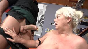 A corpulent granny is getting fucked hard in the bar in this video